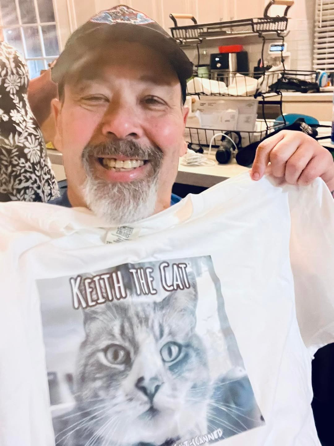 man with his Keith the Cat shirt