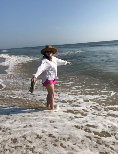 Liz in the sun and surf.