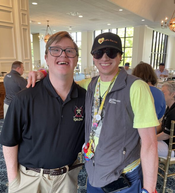 Two happy men supporting the Keith the Cat Foundation